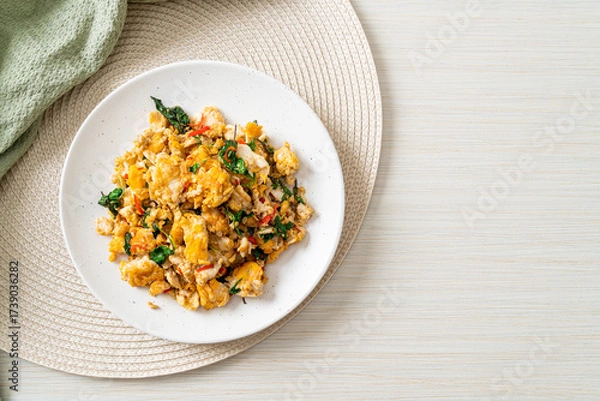 Obraz stir-fried egg with Thai basil and chilli