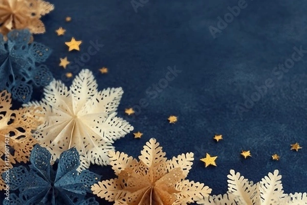 Fototapeta decoration on the blue vintage background. Paper snowflakes and golden stars. New year greeting card template. Holiday mock up. Scandinavian style.