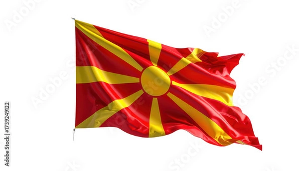 Fototapeta The national flag displays a sun motif with radiating beams in yellow against a red background, waving gently in the air.