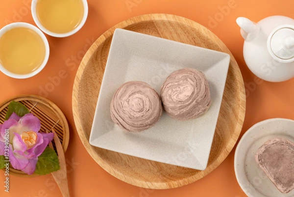 Obraz Taro puff pastries with teapot and cups for Mid Autumn Festival