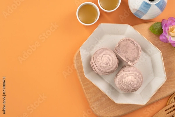 Obraz Taro puff pastries with teapot and cups for Mid Autumn Festival