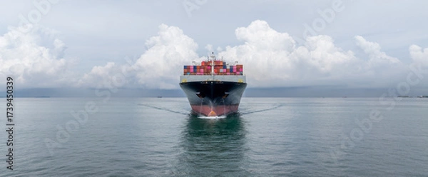 Fototapeta Container ship cargo shipping business logistic import and export freight transportation by container ship in open sea, Container loading cargo freight ship boat.