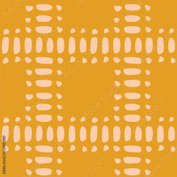 Fototapeta Hand painted brush marks and dots forming a simple checks pattern in colors of cream on yellow background. Abstract seamless vector pattern. Great for home decor, fabric, wallpaper, gift wrap, etc.