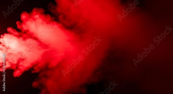 Fototapeta Abstract red smoke effect on black background creating a fiery texture