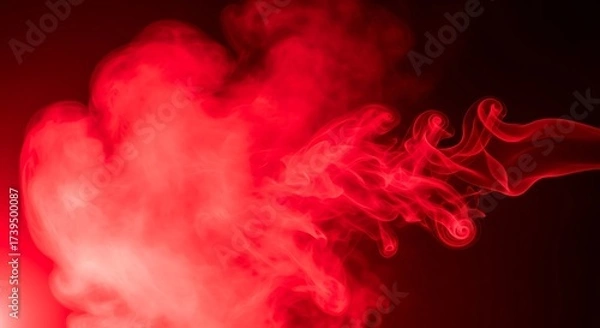 Fototapeta Dramatic red smoke effect on dark background perfect for adding mystique and depth