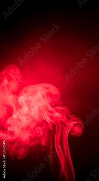 Fototapeta Abstract red smoke swirls against a dark background creating artistic patterns