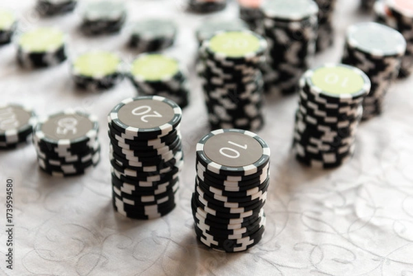 Obraz Casino chips on the table. Coins for board games.
