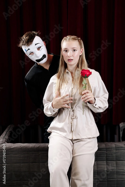 Fototapeta A pantomime scene between two actors expressing the emotion of fear. Close-up.