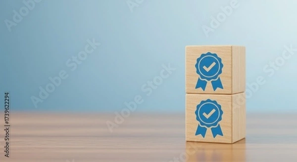Fototapeta Two wooden blocks with blue award ribbons and checkmarks