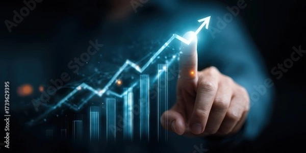 Obraz Hand Touching Upward Arrow On Digital Graph Representing Growth In Abstract Dark Background