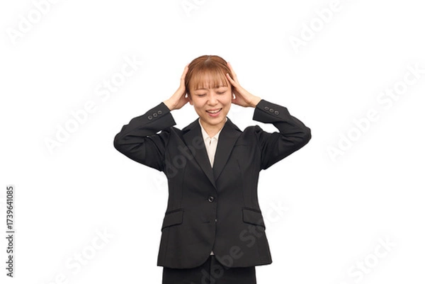 Obraz ビジネススーツを着た悩む女性