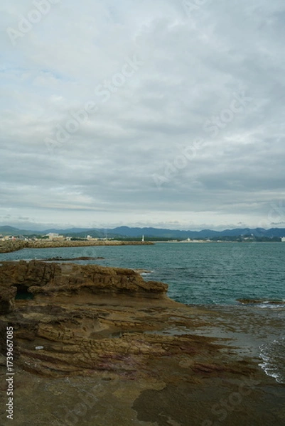Fototapeta 海岸と曇り空
