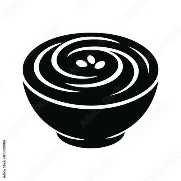 Fototapeta Bowl with swirling liquid and three floating elements.