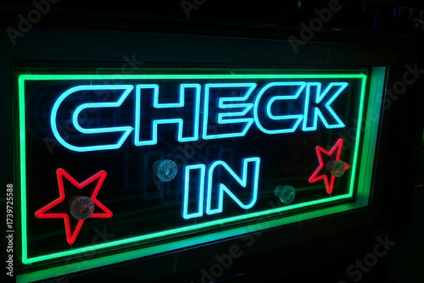 Obraz Vibrantly lit neon "CHECK IN" sign with red stars and green border at the bustling Goose Fair, Nottingham, England.