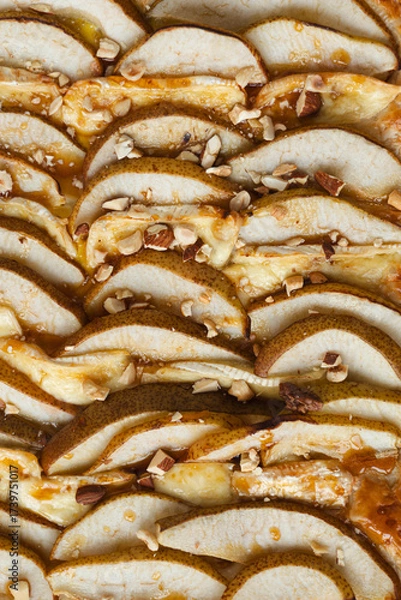 Fototapeta Puff pastry pie with camembert, pear slices, honey and nuts.