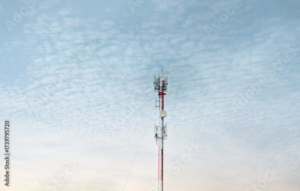 Fototapeta Signal tower or Mobile phone tower .Global connection and internet network concept.on blue sky,Telecommunication tower.