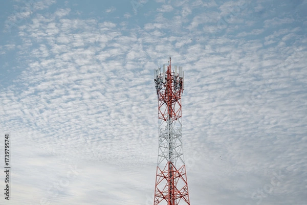 Fototapeta Signal tower or Mobile phone tower .Global connection and internet network concept.on blue sky,Telecommunication tower.