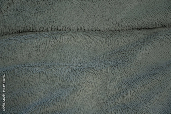 Fototapeta A fuzzy gray fabric with a lot of texture
