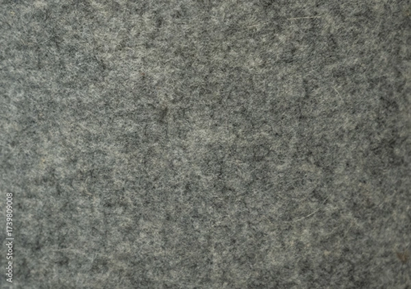Fototapeta A gray and white fabric with a fuzzy texture