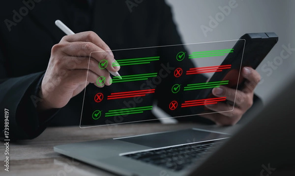 Fototapeta Businessman using digital checklist interface with green check marks and red cross marks for task management, evaluation, productivity, and business technology.