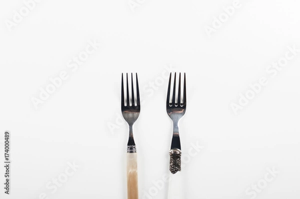Obraz Forks on white background. Copy space.