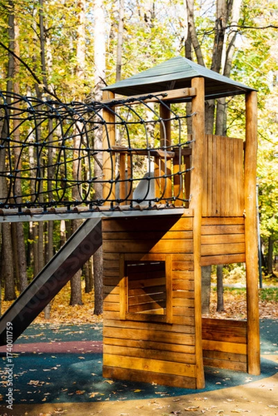 Fototapeta The autumn playground invites all ages to partake in engaging activities that inspire adventure, strengthen family bonds, promote exercise, and bring joy in a picturesque, naturefilled setting
