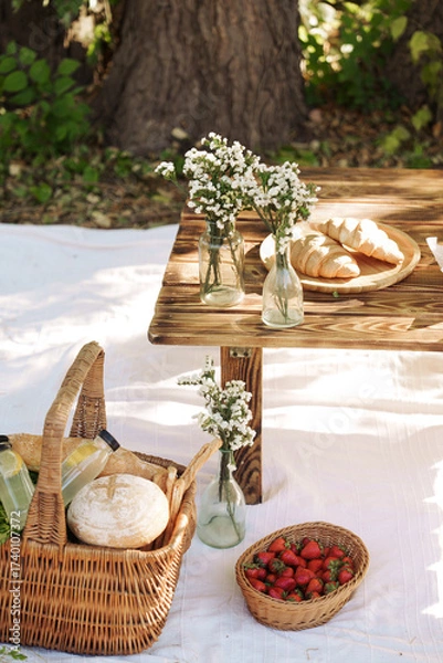 Obraz Summer picnic with fresh bread, lemonade and strawberries