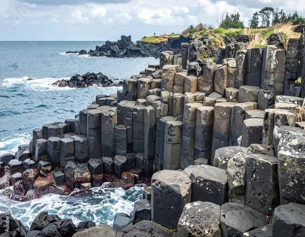 Fototapeta Coastal Landscape Featuring Basalt Columns and Ocean Waves