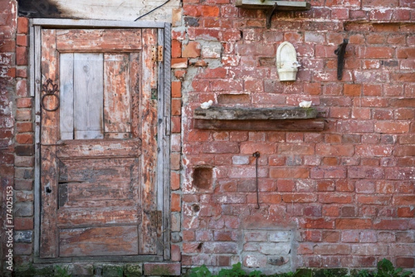 Obraz The door on the brick wall