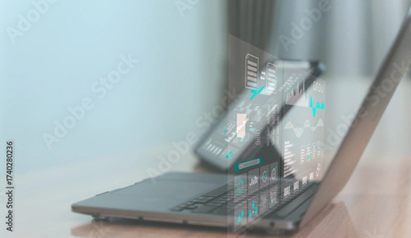Fototapeta Digital data analytics and virtual dashboard concept on laptop computer.
