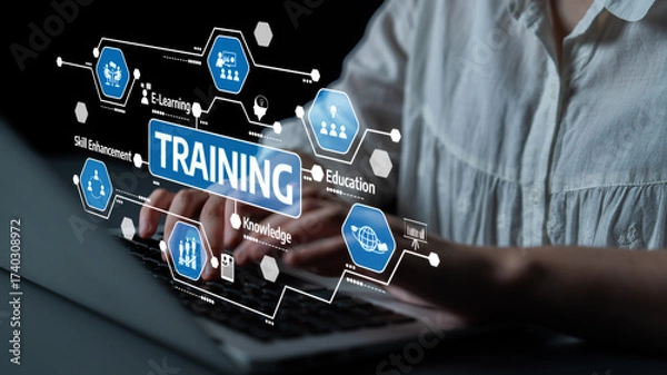 Fototapeta Explore the transformative power of training and professional development through e-learning, featuring interactive digital elements and a laptop in focus. Tessel