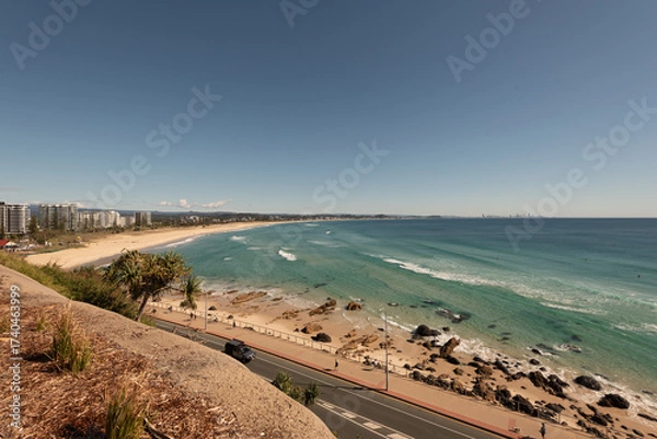 Obraz Kirra Beach from the top of Kirra Point, Queensland, Australia. The skyscrapers of the Sunshine Coast on the horizon in the distance.