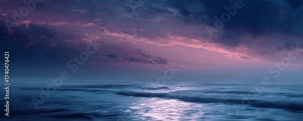 Fototapeta Ocean Sunset with Cloudy Sky and Waves