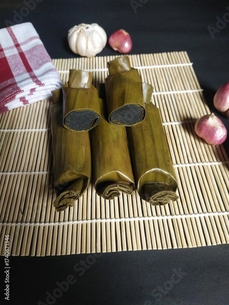 Obraz Kue Ireng-Ireng , Indonesian Traditional Food Wrapped in   Banana Leaves