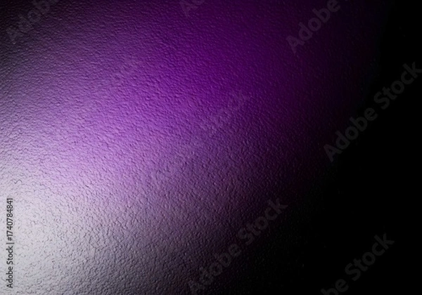 Obraz A moody abstract background featuring a textured purple gradient fading into a deep black void.