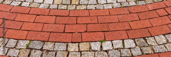 Obraz Panoramic image. Red cobblestones arranged in round