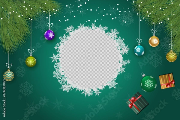Fototapeta Christmas balls are hanging with snowflakes around a transparent central frame on green backdrop