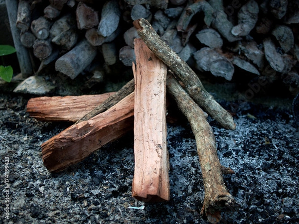 Obraz burning fire wood on ground and texture
