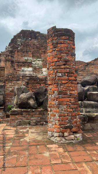 Fototapeta Wat Chaiwatthanaram in Ayutthaya, Thailand. Scenic ruins of the Buddhist temple in the ancient city. Buildings destroyed by time.