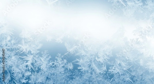 Fototapeta Icy Frosty Background with Delicate Snowflakes and Winter Ice Crystals on a Blue Gradient