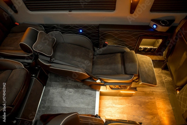Fototapeta Comfortable interior of a passenger bus with soft seats