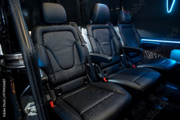 Fototapeta Comfortable interior of a passenger bus with soft seats