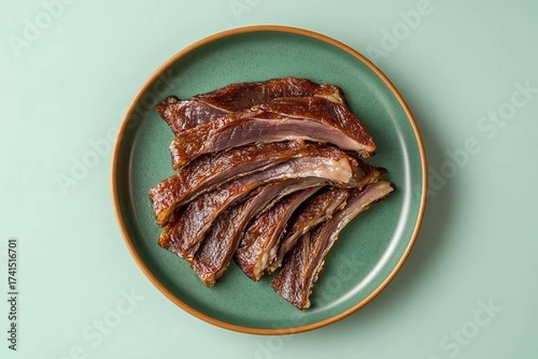Obraz A plate with crispy skin from Peking ducks on a pale green backdrop, Generative AI.
