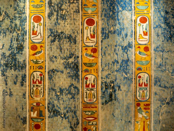 Obraz VALLEY OF THE KINGS, EGYPT : Interior of a tomb in the Valley of the Kings, featuring intricate wall paintings and hieroglyphs that tell stories of ancient Egyptian pharaohs.