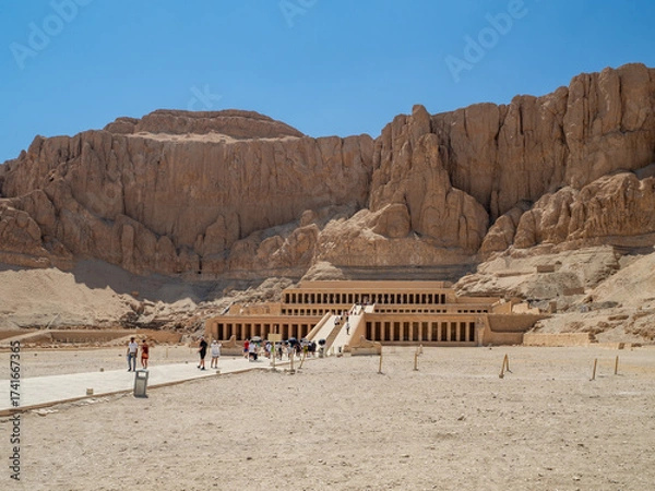 Fototapeta LUXOR, EGYPT : The Mortuary Temple of Hatshepsut at Valley of the Queens, an impressive ancient Egyptian monument built into limestone cliffs, visited by travelers from around the world.
