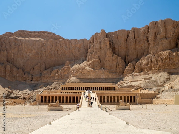Fototapeta LUXOR, EGYPT : The Mortuary Temple of Hatshepsut at Valley of the Queens, an impressive ancient Egyptian monument built into limestone cliffs, visited by travelers from around the world.