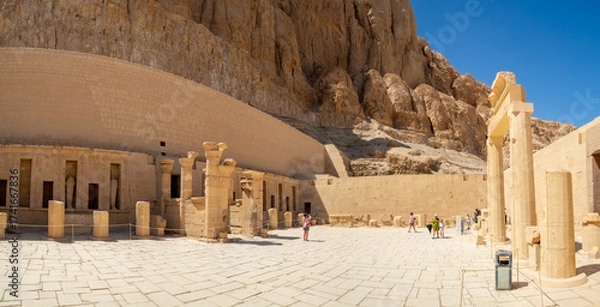 Fototapeta LUXOR, EGYPT : The Mortuary Temple of Hatshepsut at Valley of the Queens, an impressive ancient Egyptian monument built into limestone cliffs, visited by travelers from around the world.