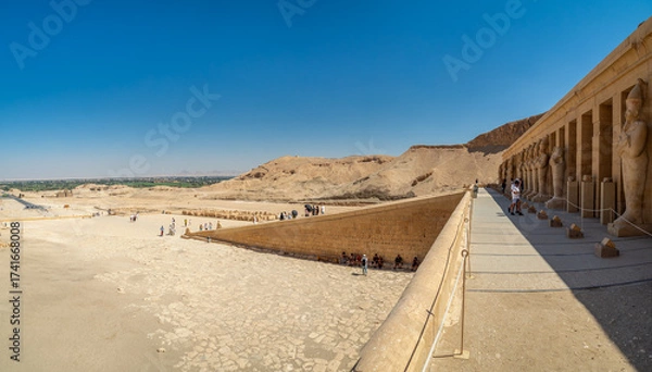 Fototapeta LUXOR, EGYPT : The Mortuary Temple of Hatshepsut at Valley of the Queens, an impressive ancient Egyptian monument built into limestone cliffs, visited by travelers from around the world.