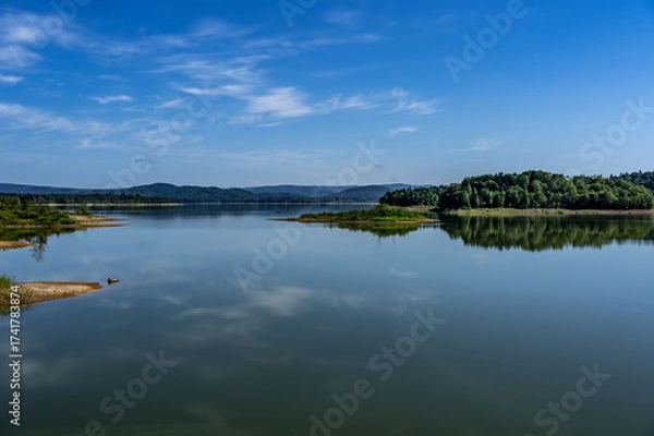 Obraz Lake Shumarinai on a Calm Day with Glassy Reflections