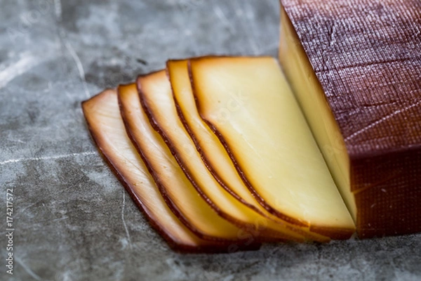 Obraz Sliced smoked cheese